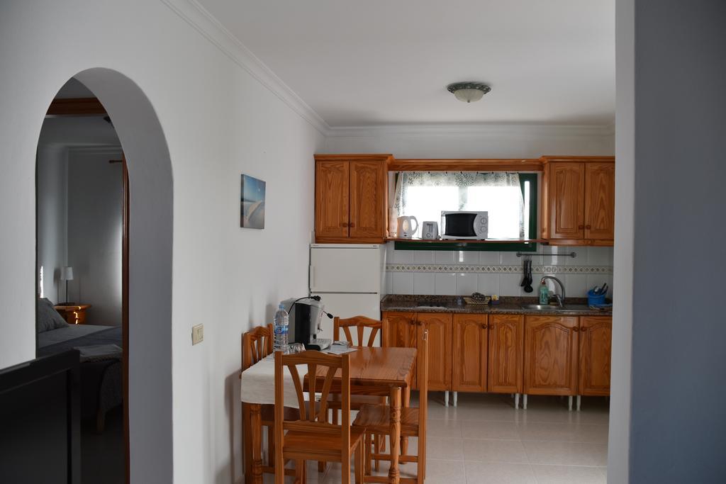 Alhambra Apartamentos Tías Esterno foto