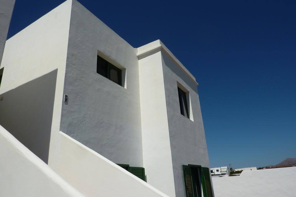 Alhambra Apartamentos Tías Esterno foto
